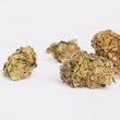 Load image into Gallery viewer, This image displays a collection of Melonade CBD flowers strain, characterized by their green hue with purple flecks.
